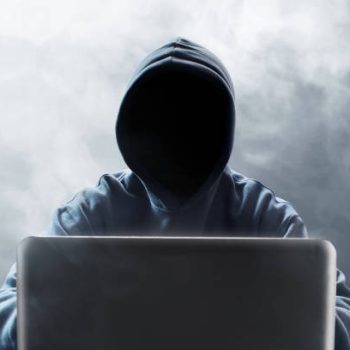 Hacker using laptop